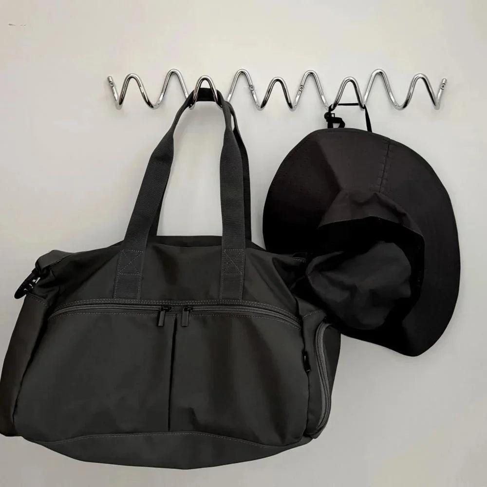 Miro – Crochet à vagues moderne en fer